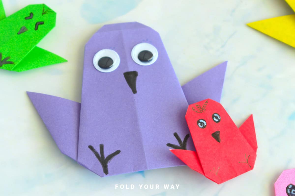 Close up image of origami chickens.