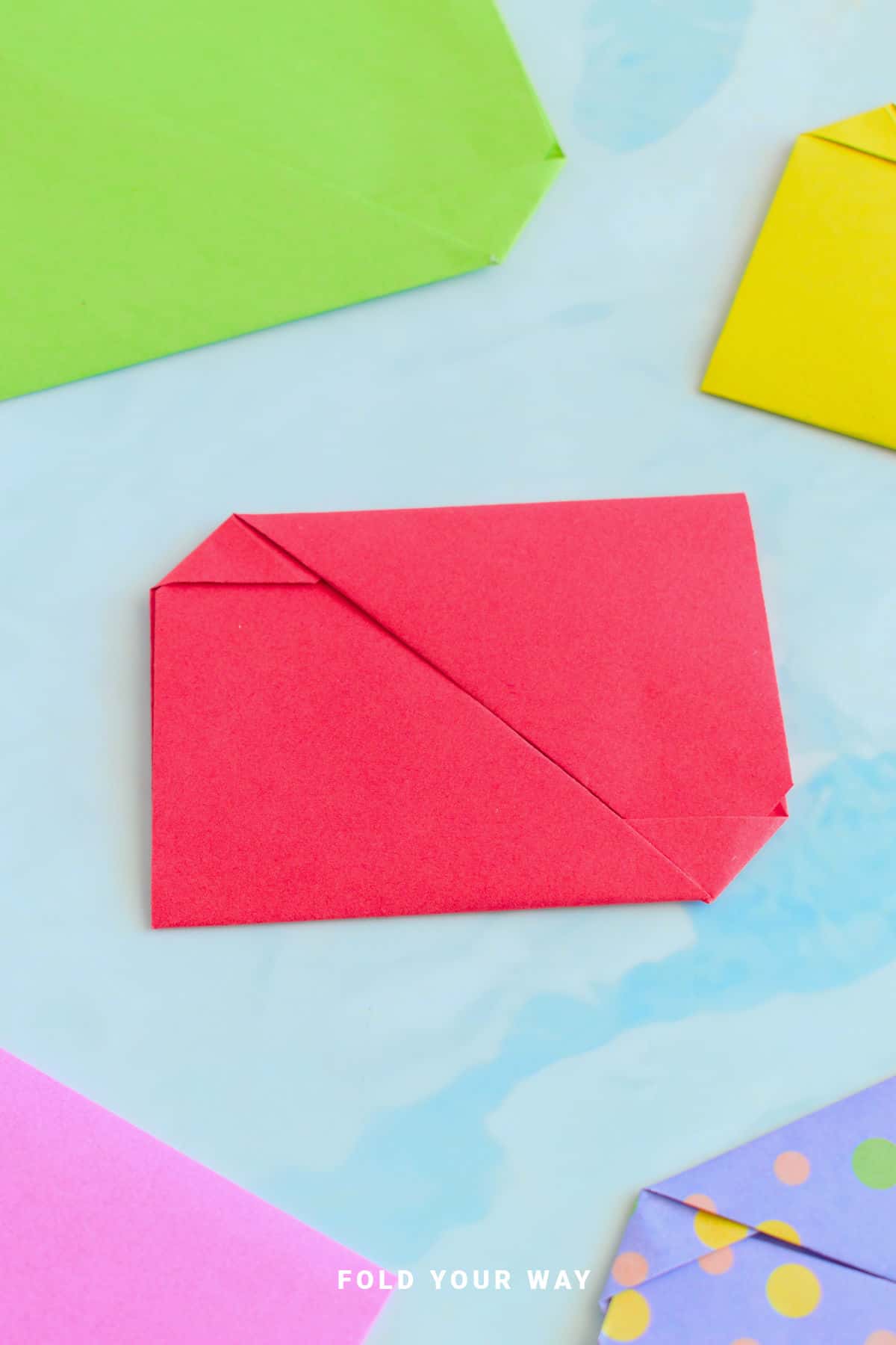 Red origami envelope letterfold.