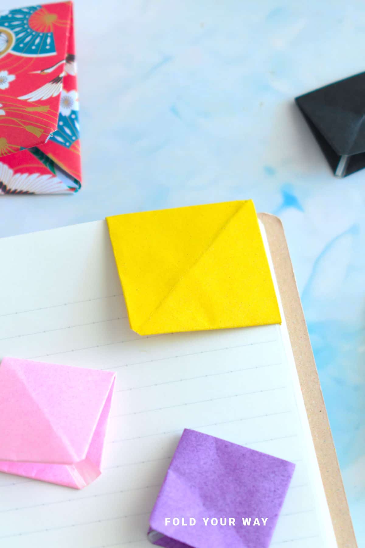 Yellow corner origami bookmark.