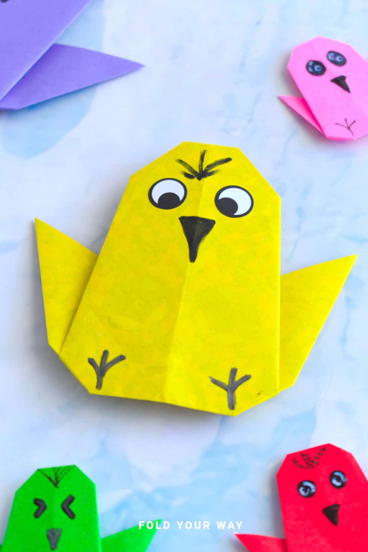 Yellow origami chicken.
