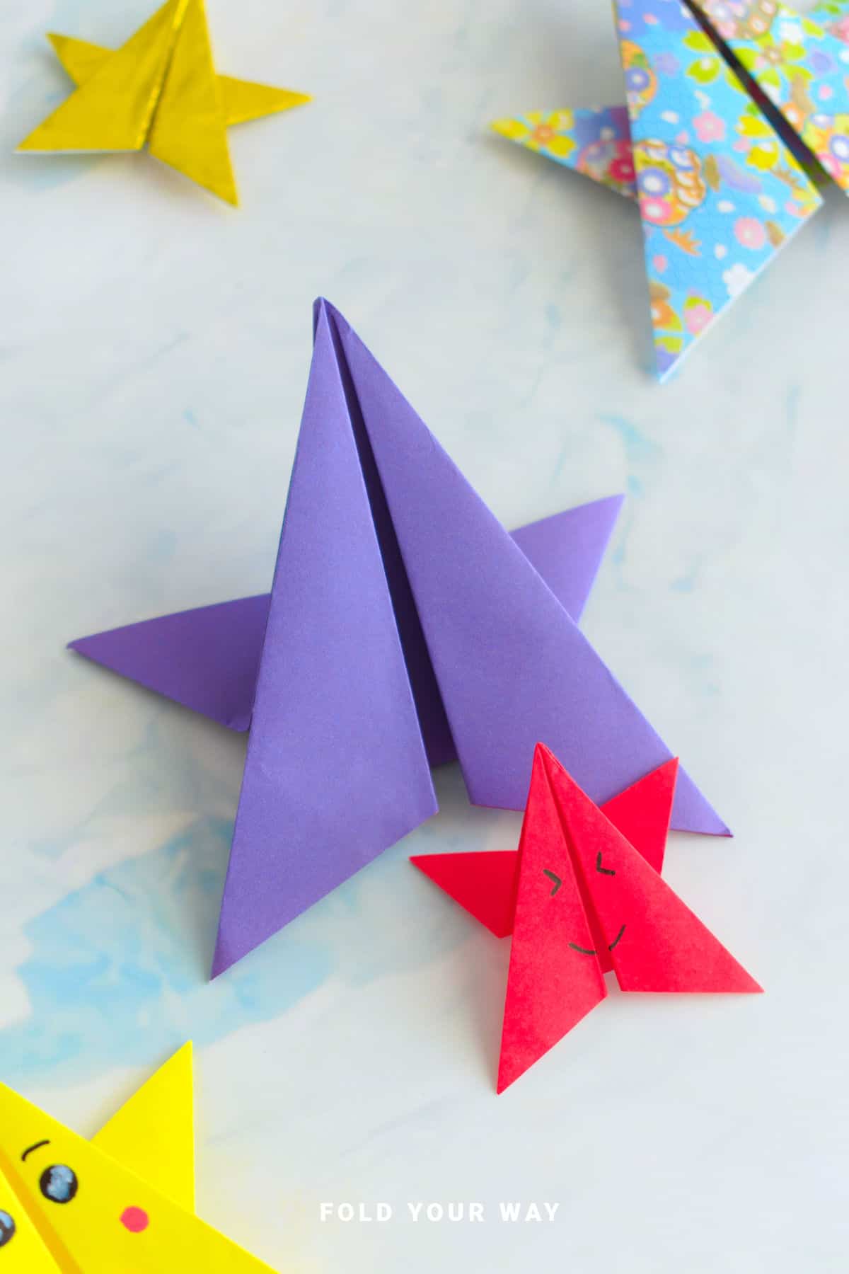 Purple and red origami stars.
