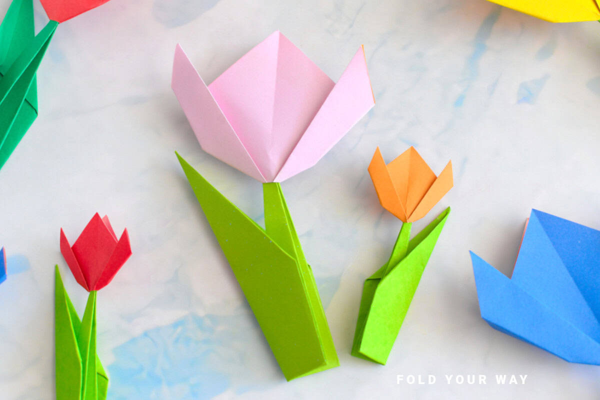Pink, orange, and red origami tulips.