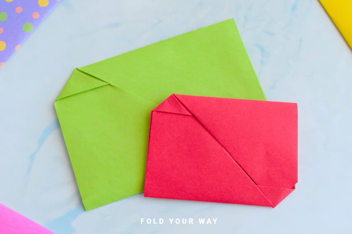 Red and green origami envelope letterfolds.