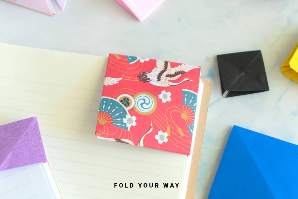 Close up image of a square corner origami bookmark.