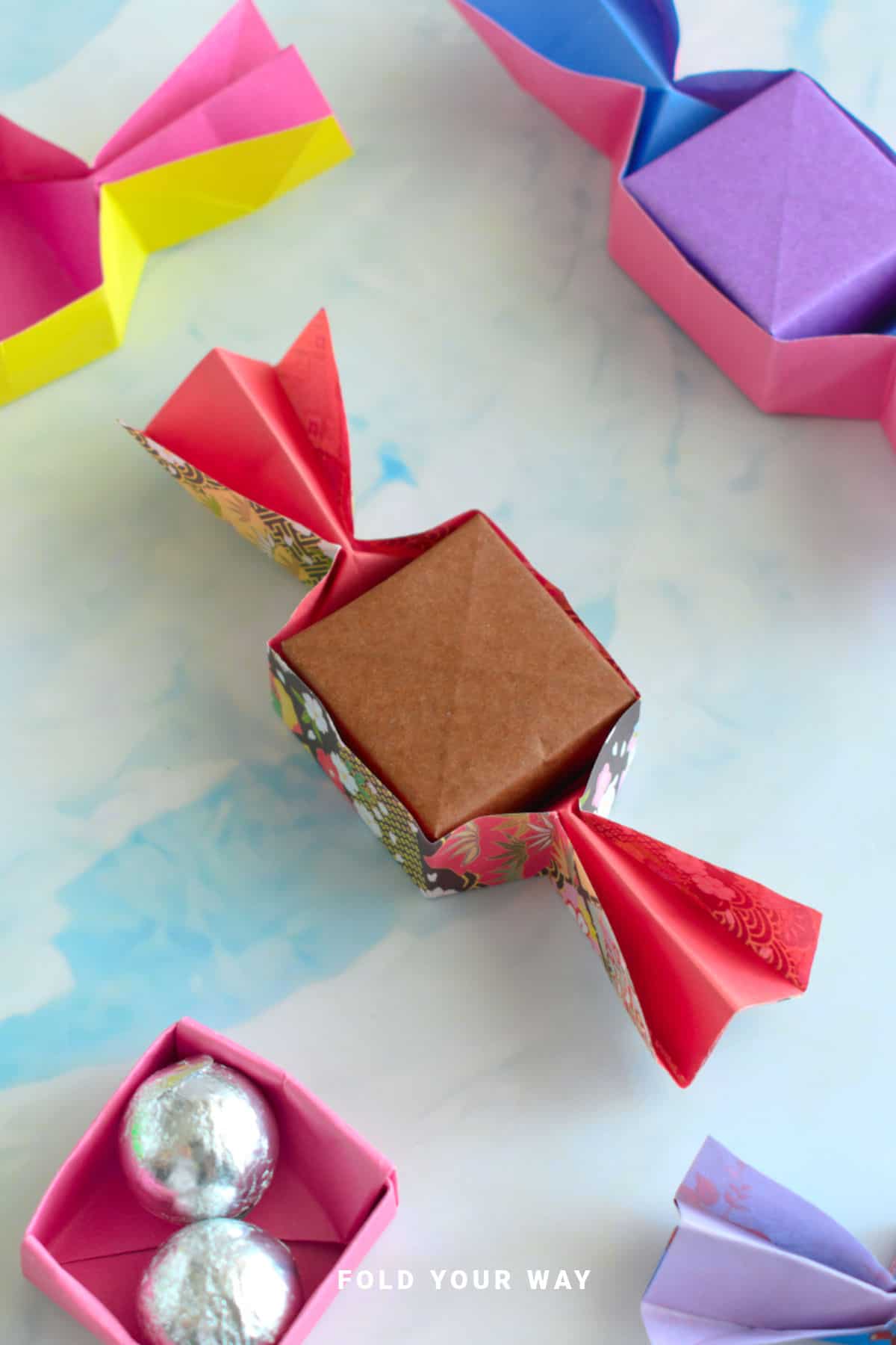 Brown and red candy origami box.