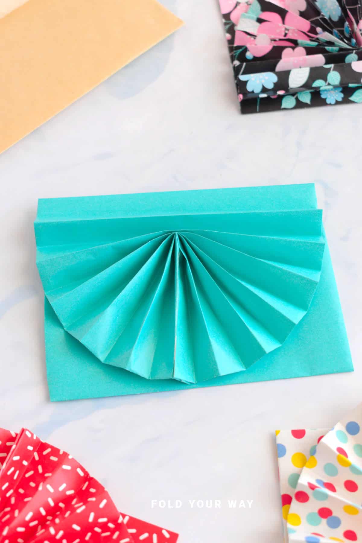 Blue envelope with fan.