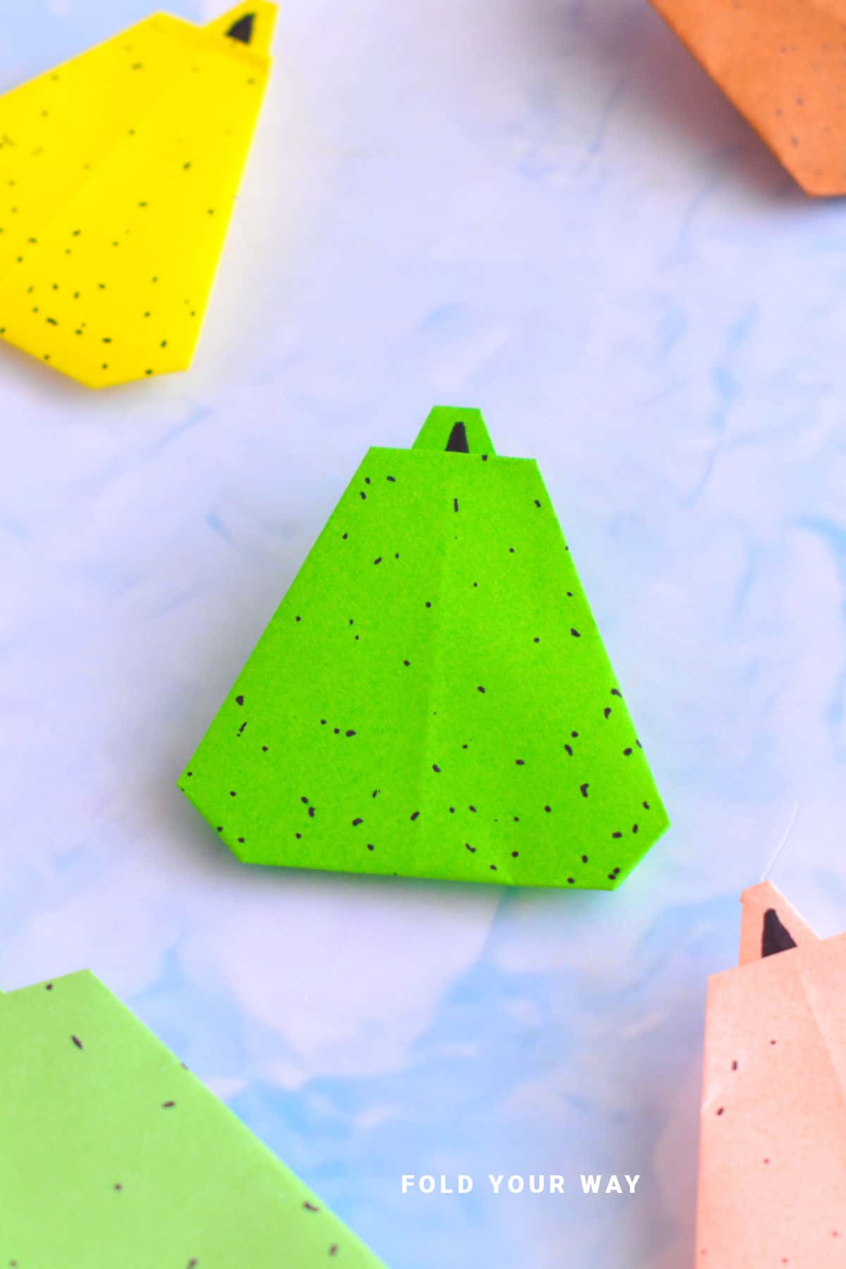 Green origami pear.