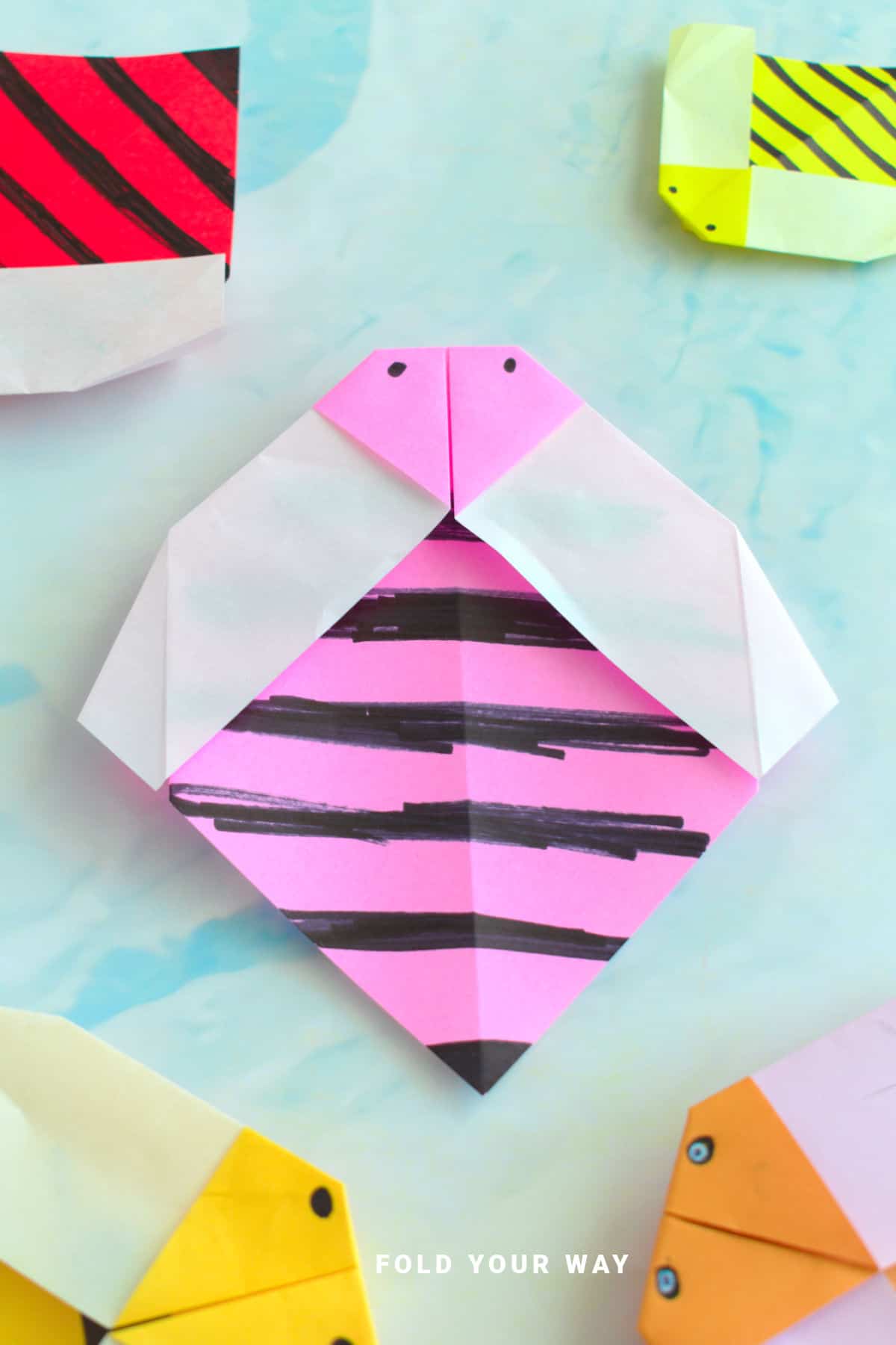 Pink origami bee.