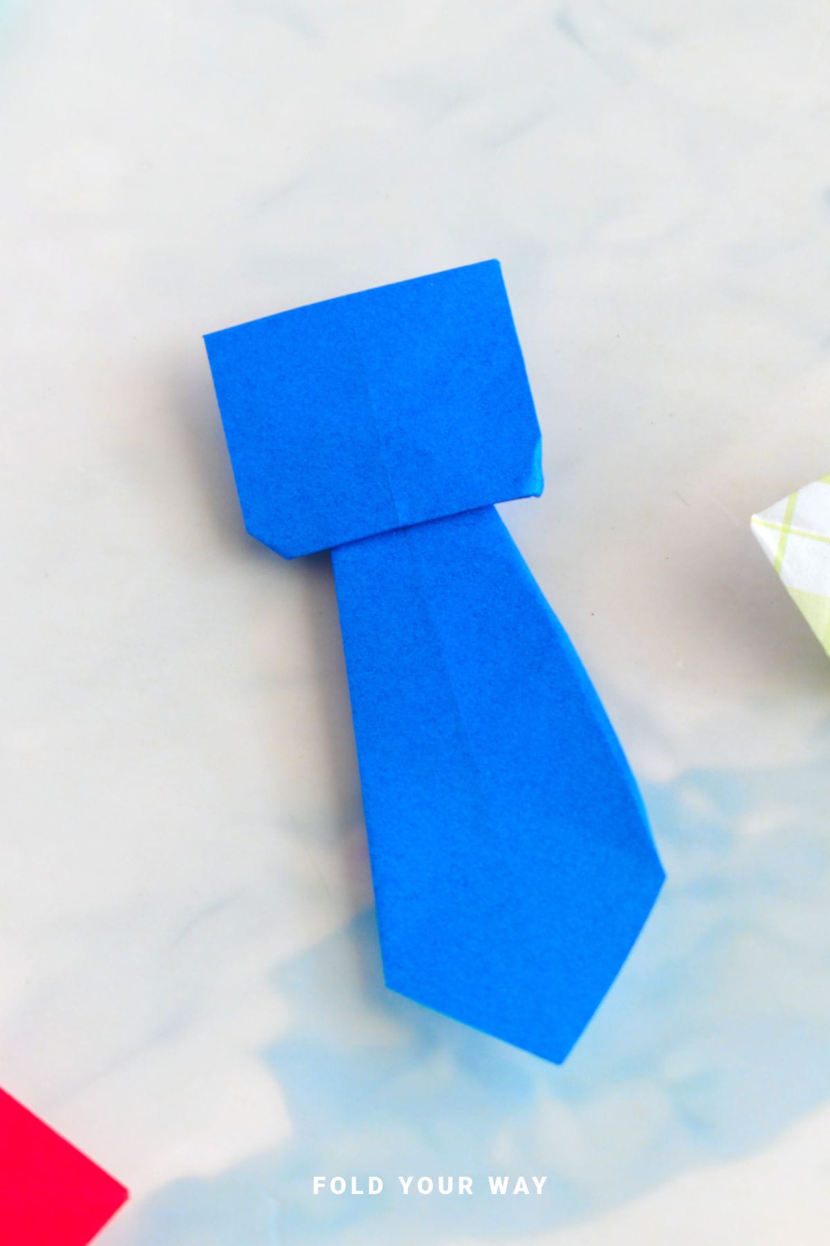 Blue origami tie.