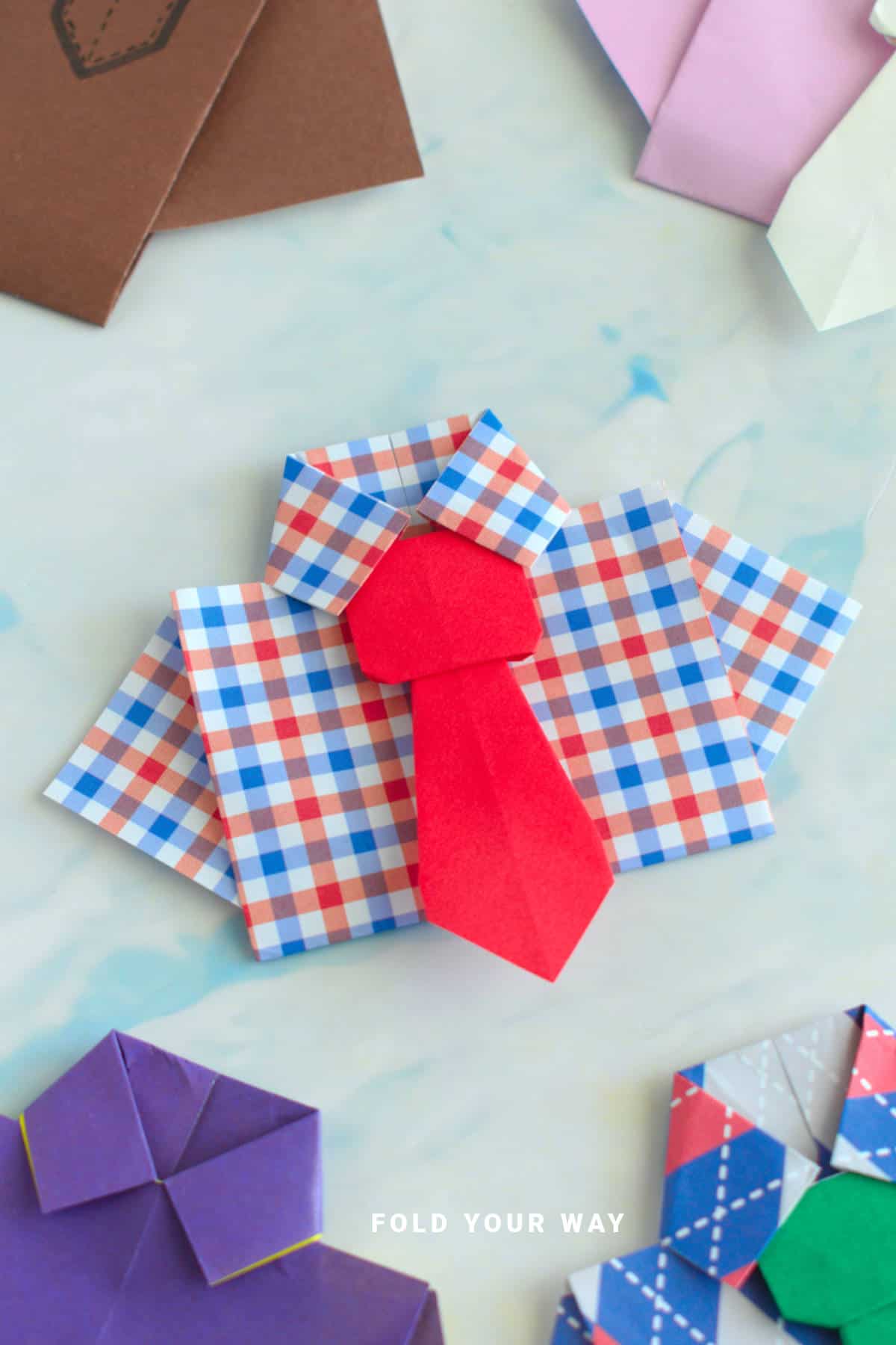 Close up image of an origami shirt.