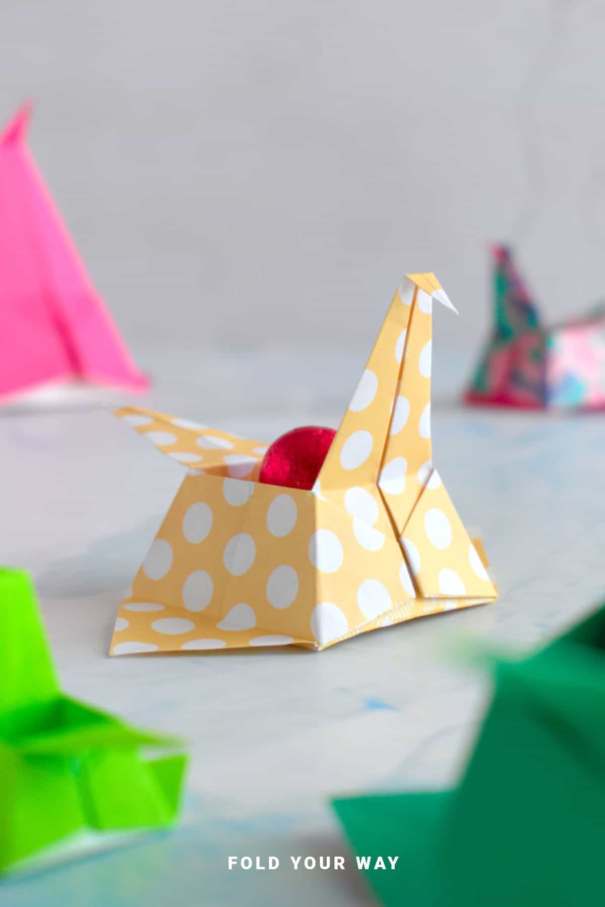 Yellow spotted crane origami box.
