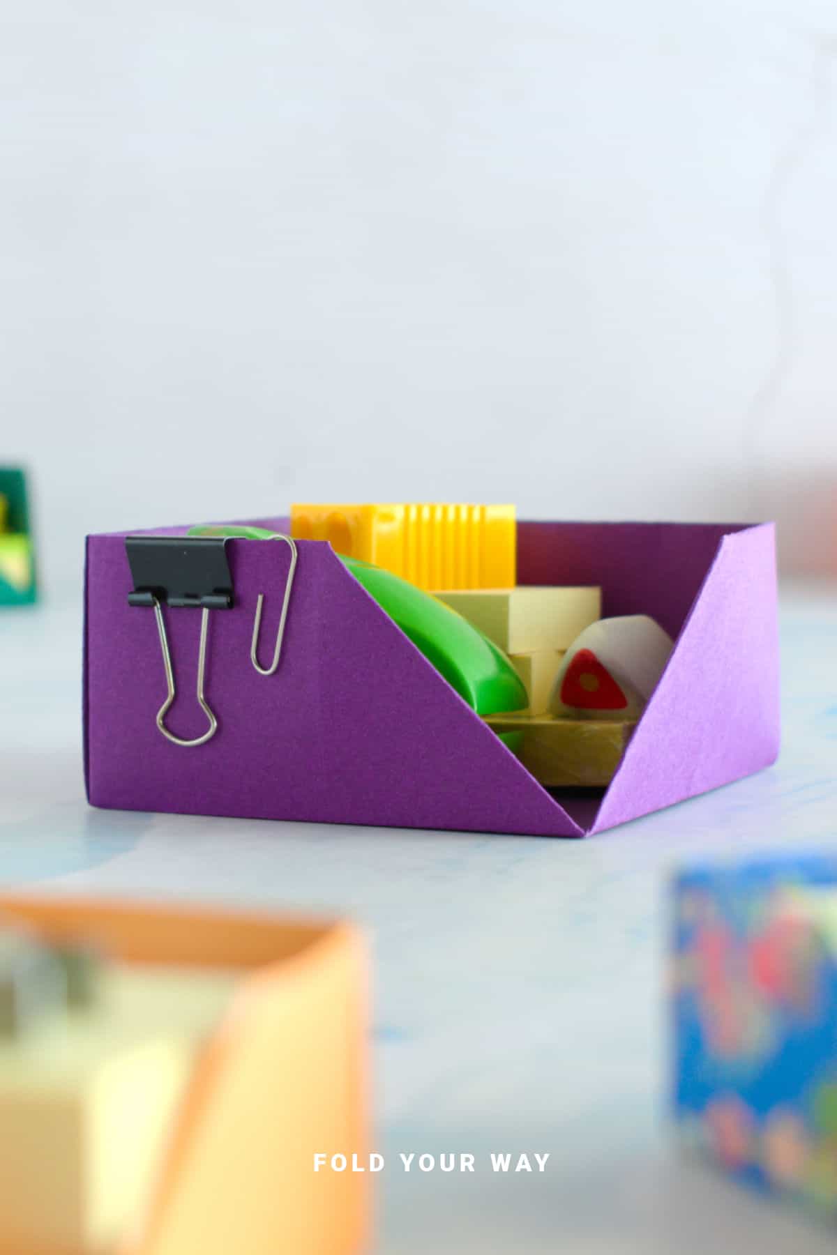 Purple origami desk organizer.