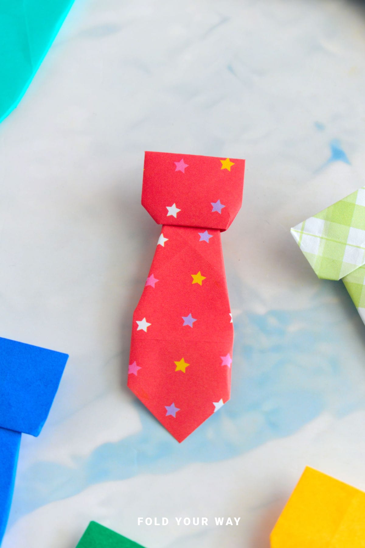 Red origami paper tie.