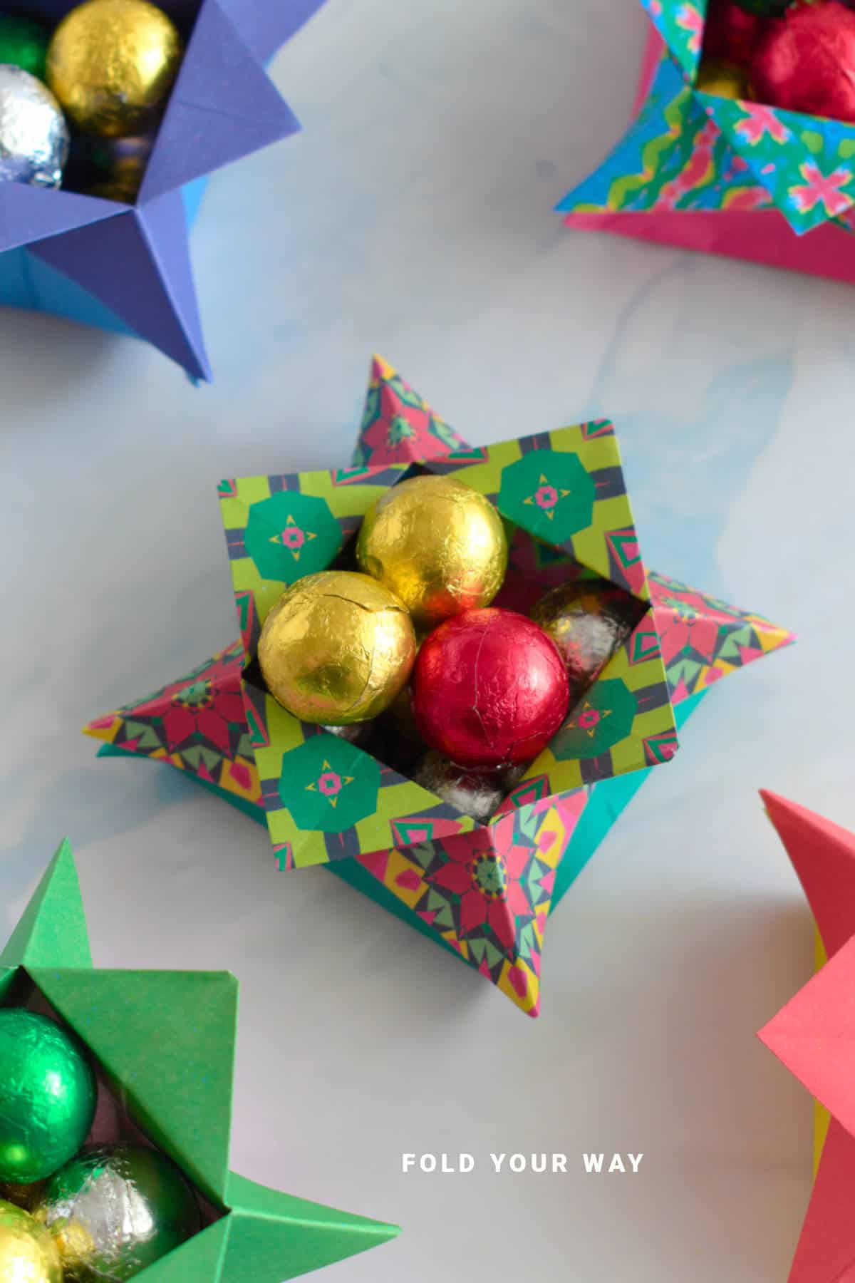 Green and red origami star box.