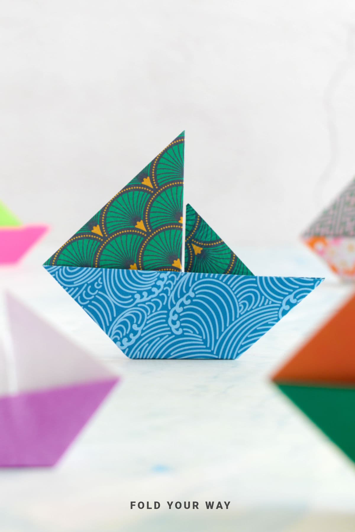 Close up image of an origami boat.