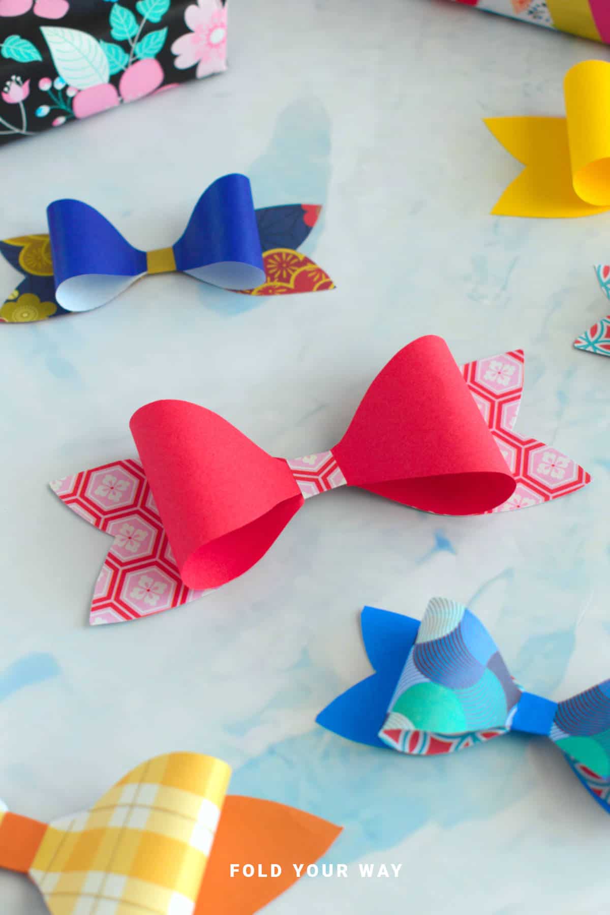 Red paper bow.