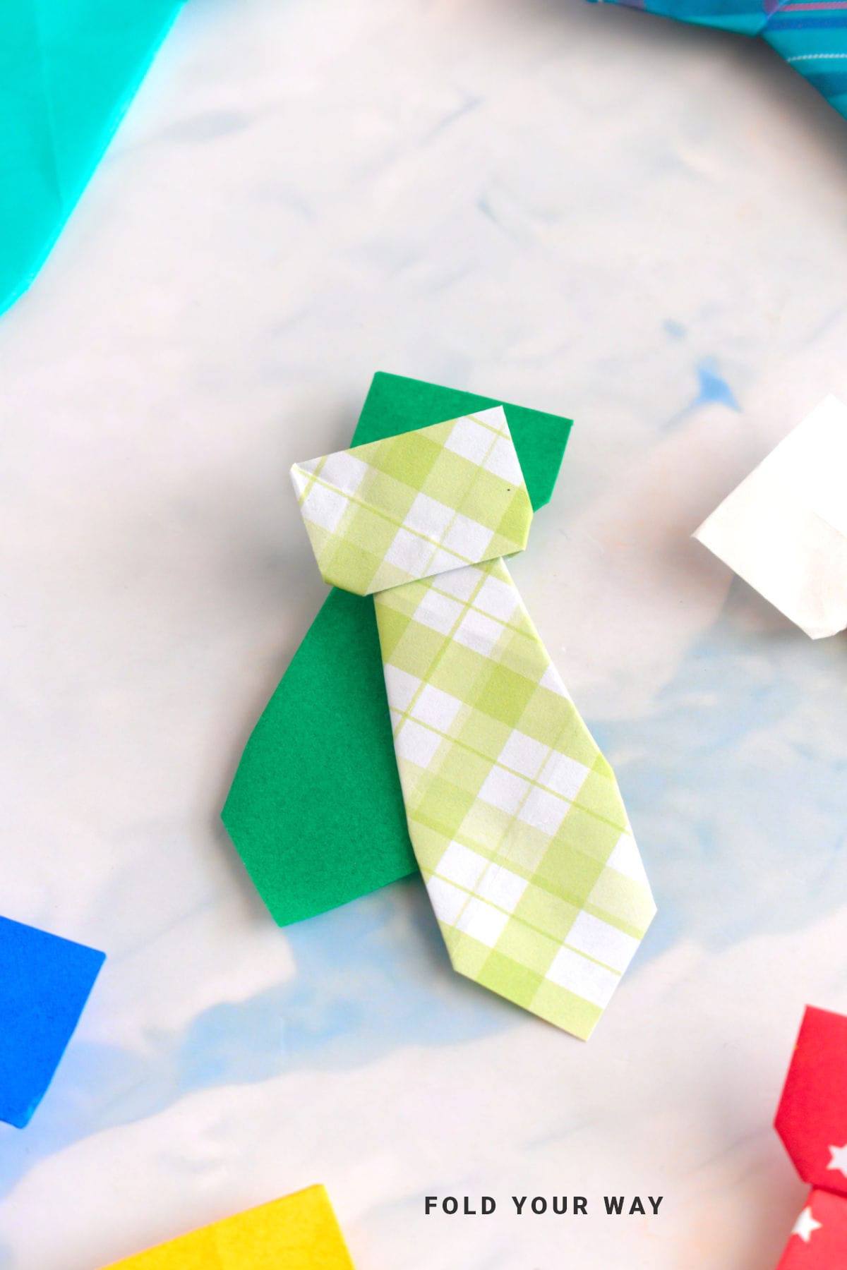 Green origami ties.