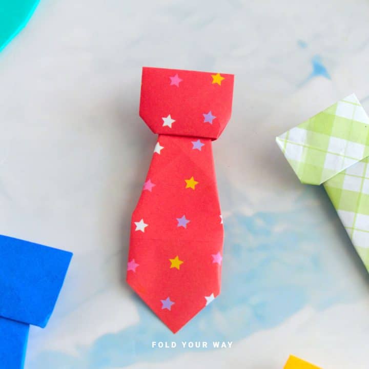 Close up image of red paper tie.