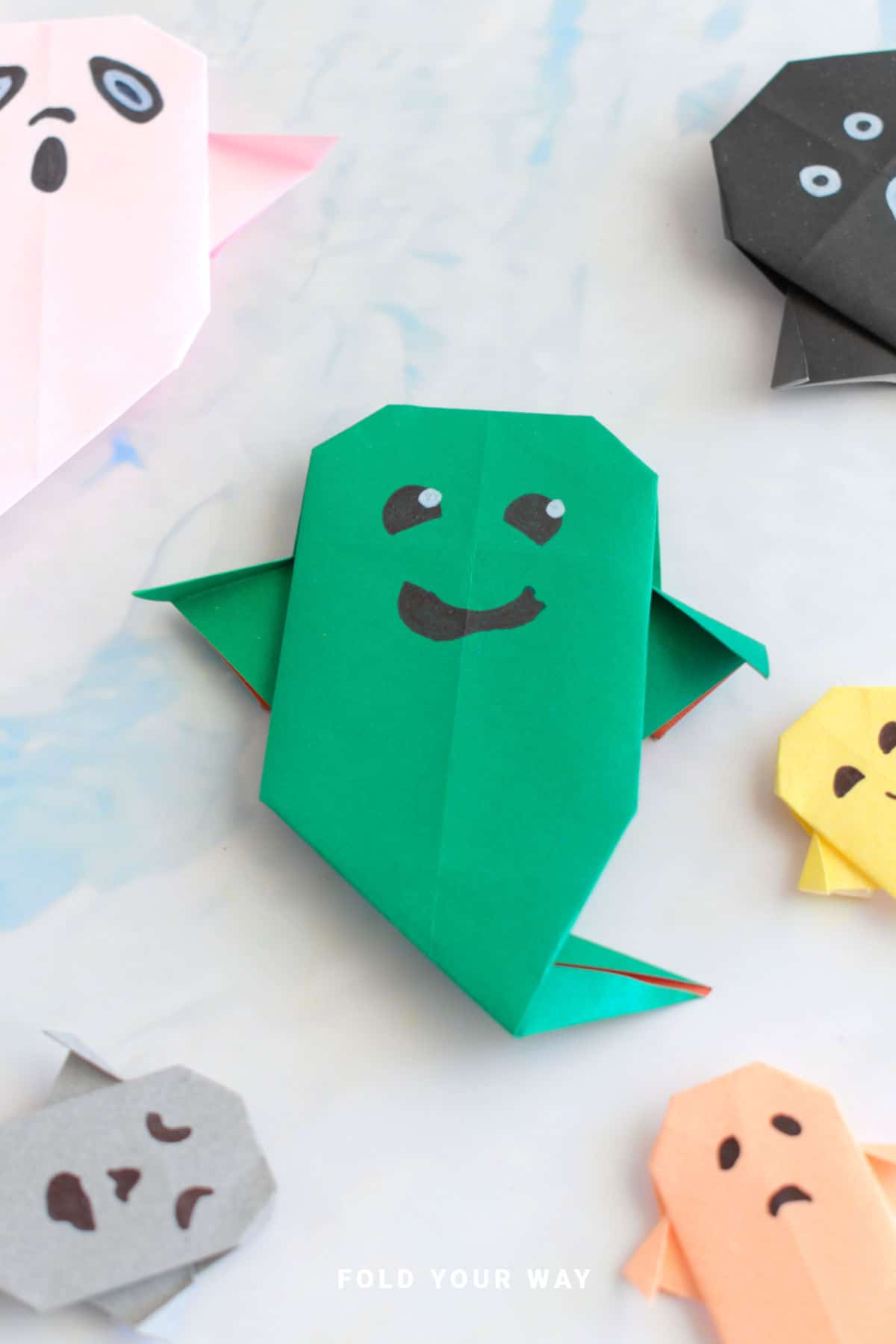 Green origami ghost.