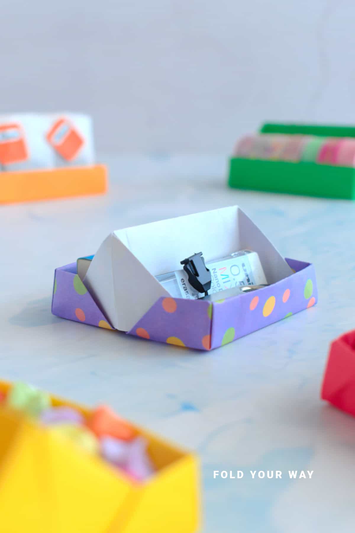 Purple spotted origami tray.