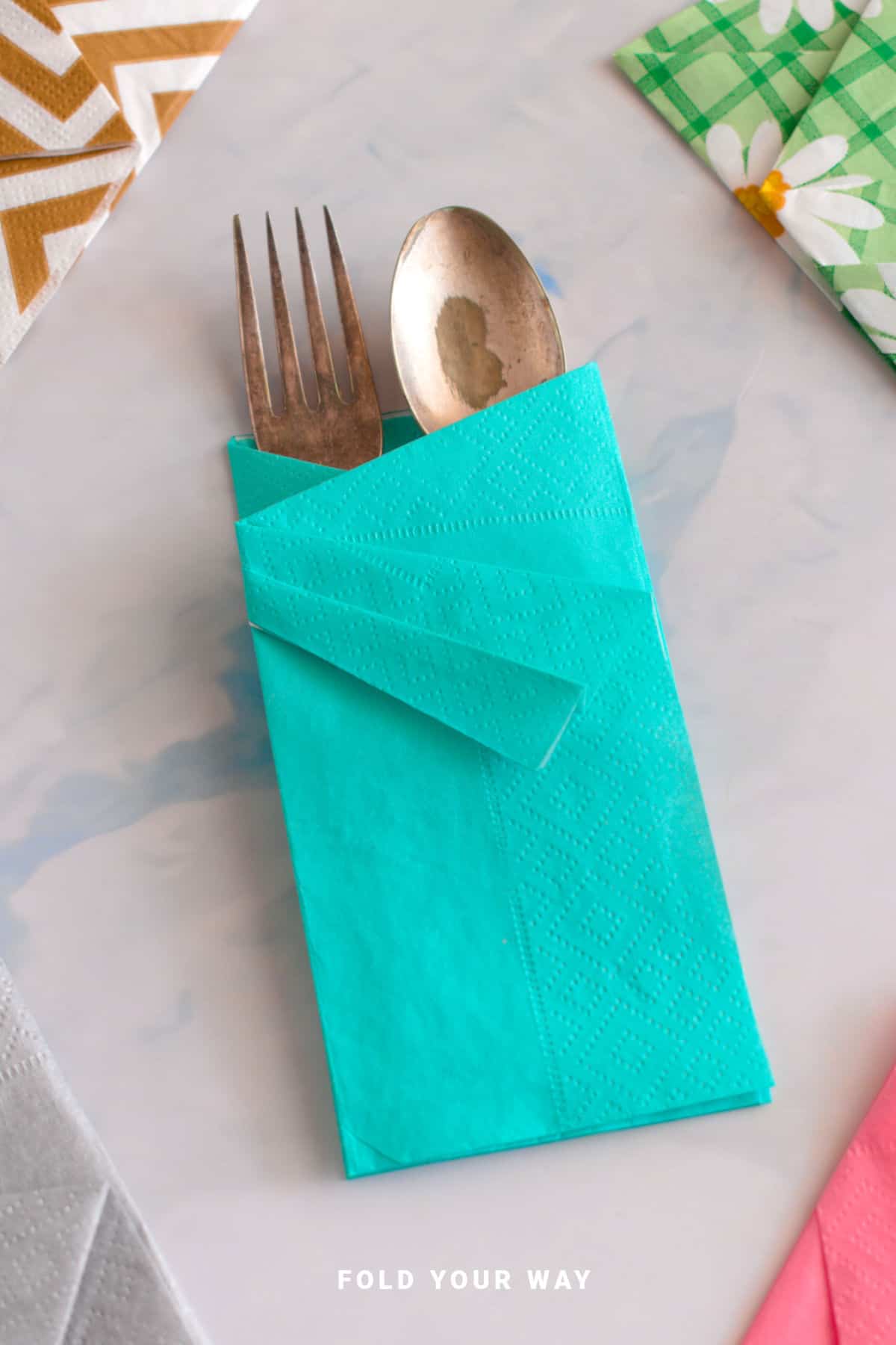 Blue napkin fold.