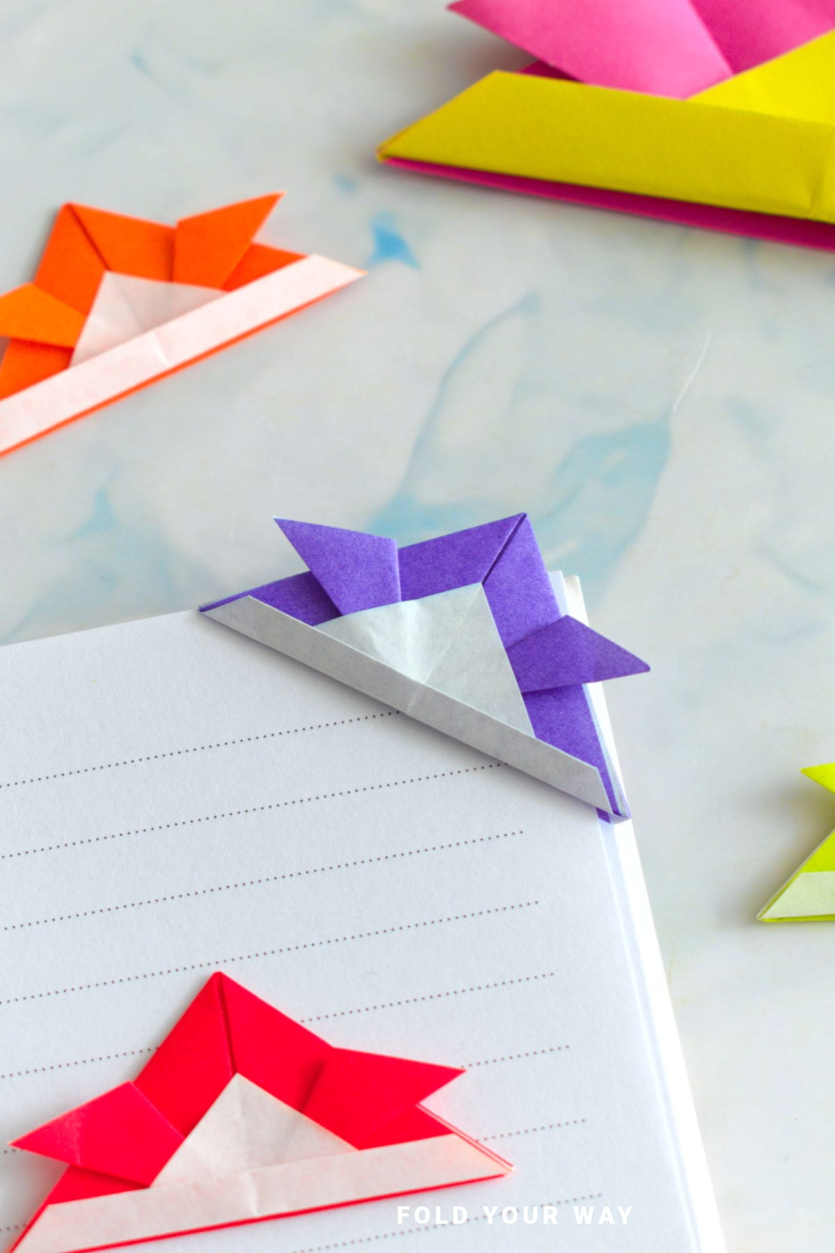 Purple samurai hat origami bookmark.