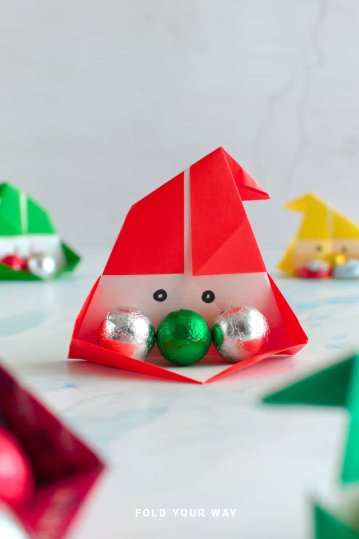Close up image of a Santa origami box.