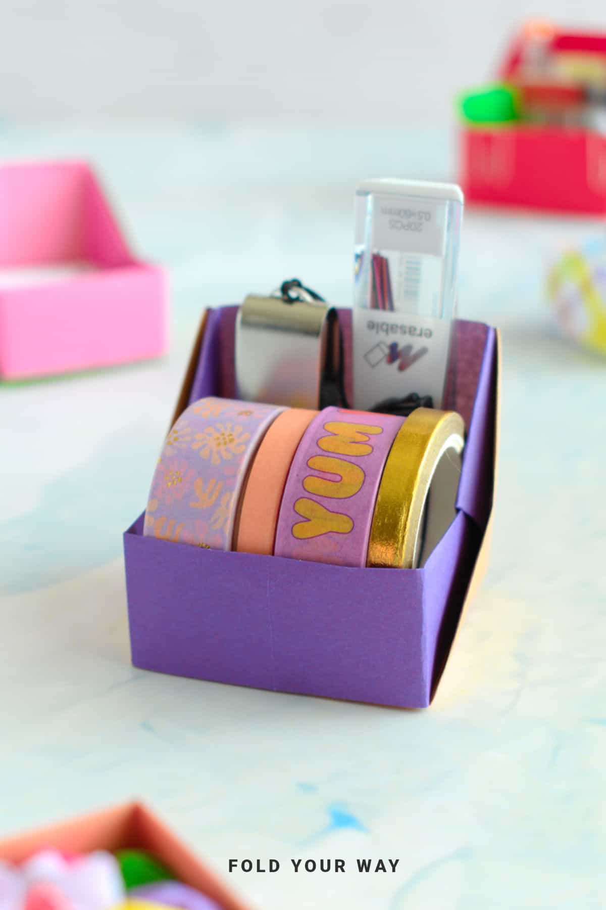 Purple origami desk organizer.