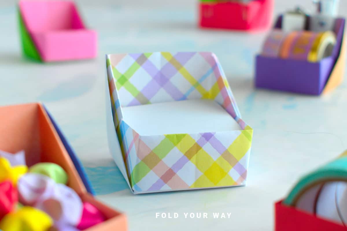 Close up image of an origami desk organizer.