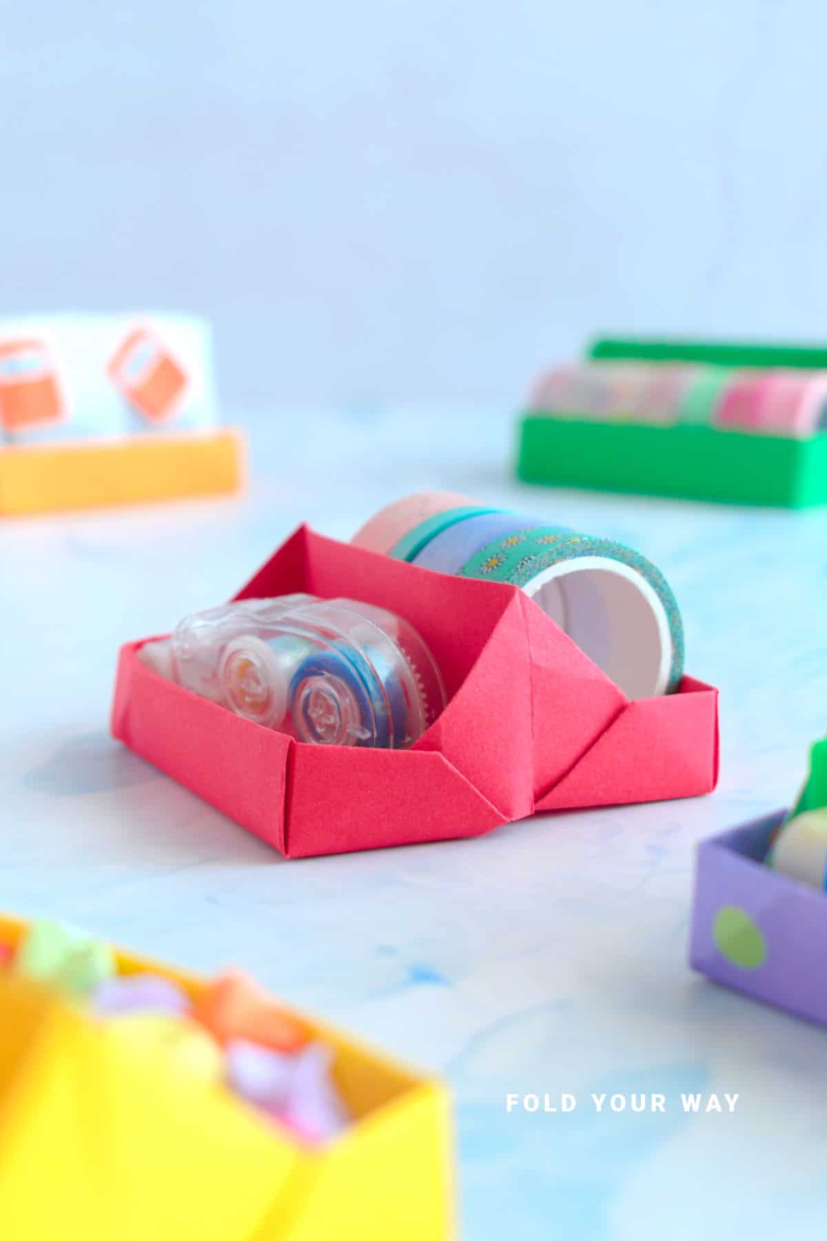 Red origami tray.