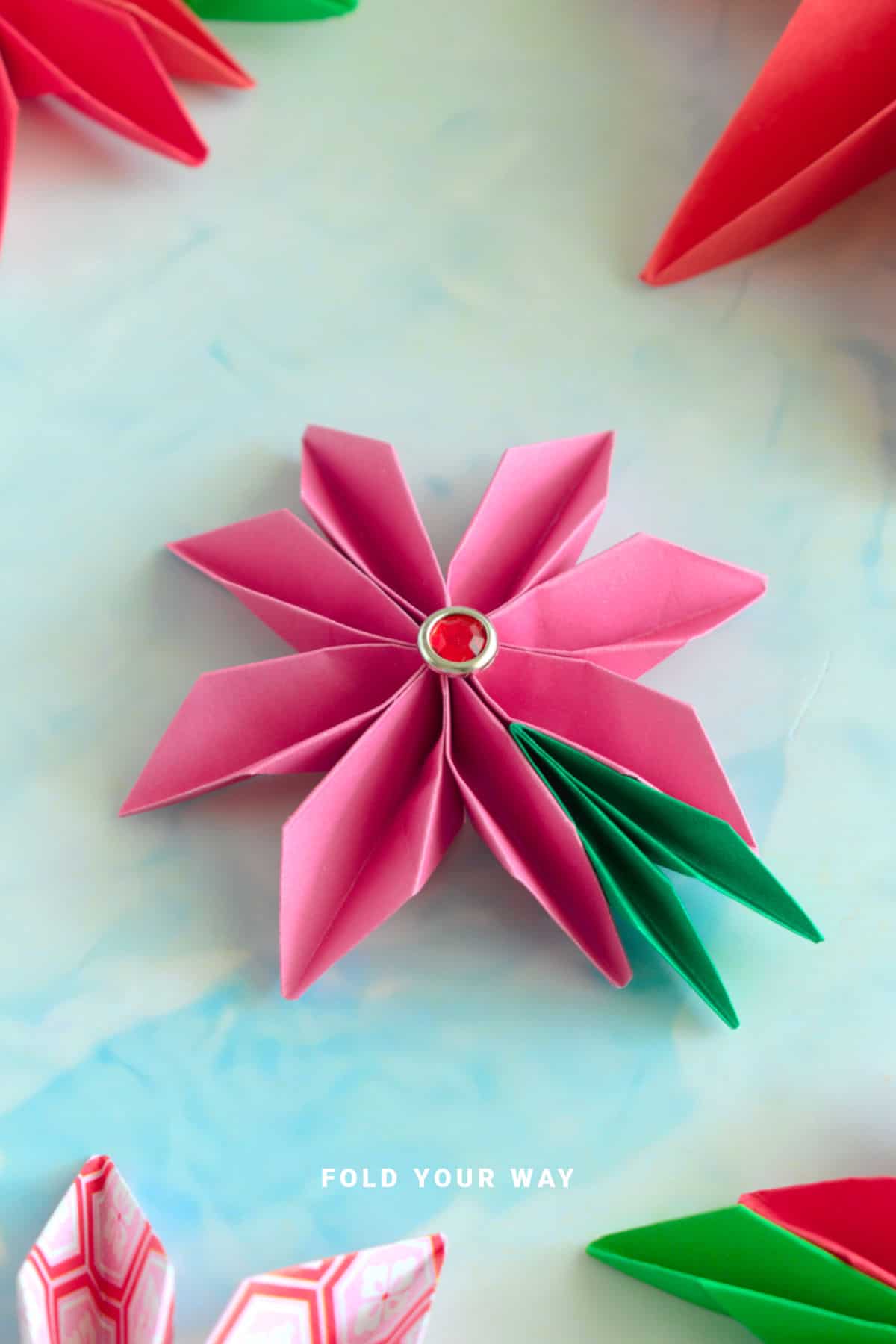 Pink origami poinsettia.
