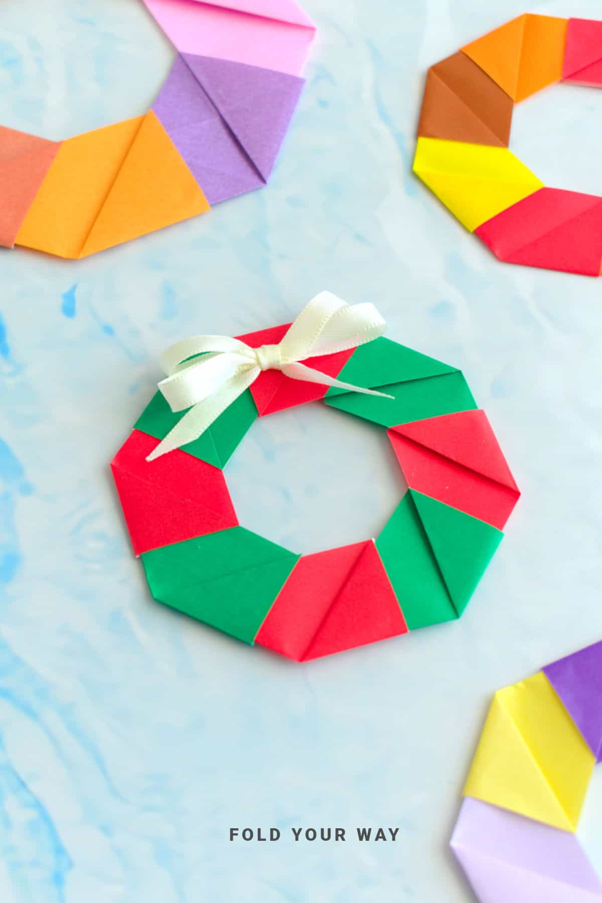 Red and green origami wreath.
