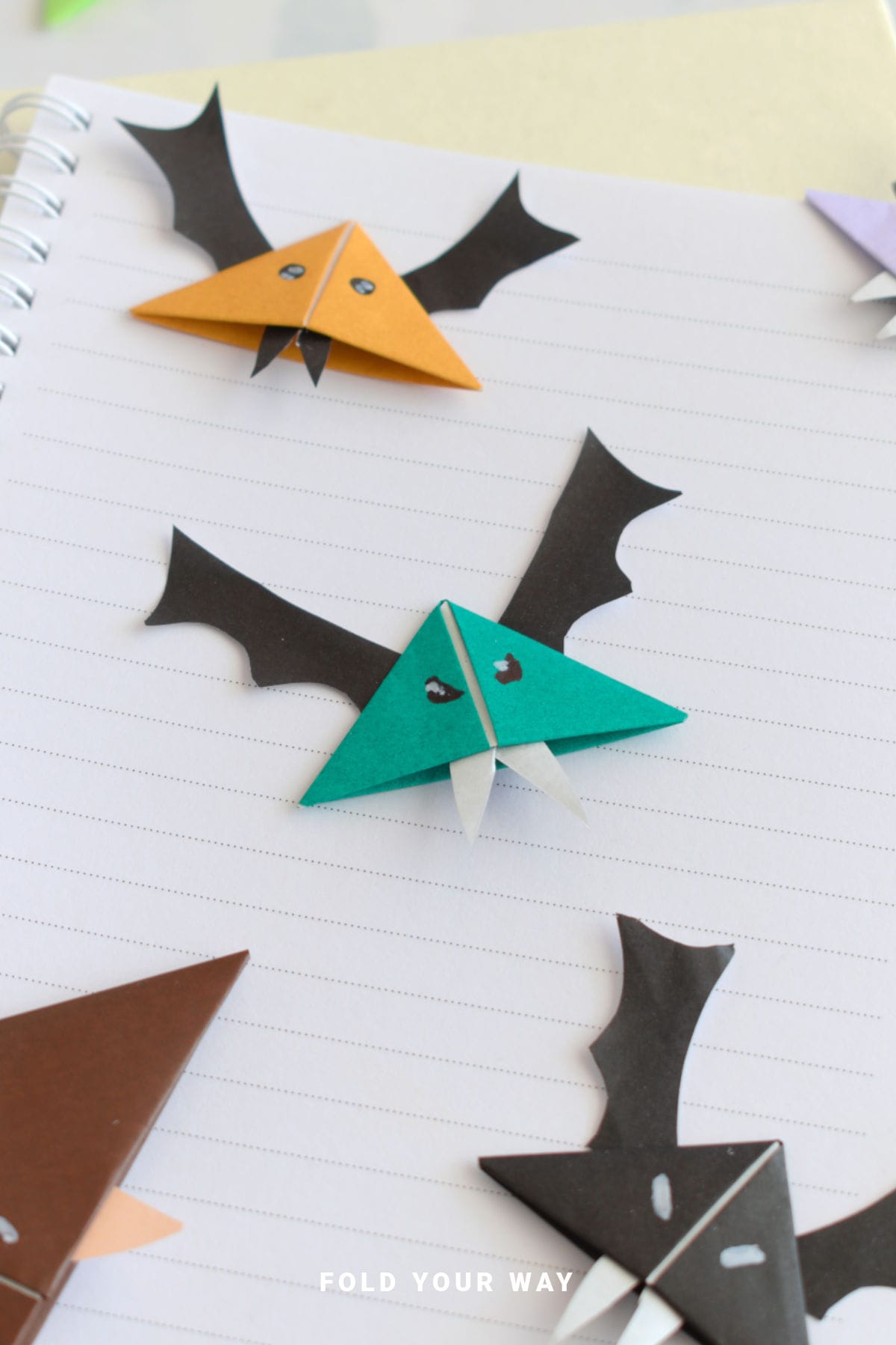 Close up image of origami bat bookmarks.