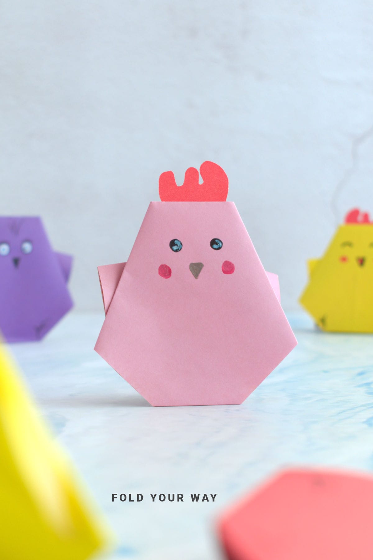Pink origami chicken.
