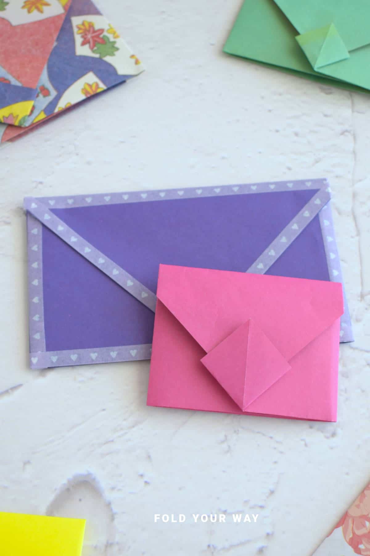 Purple and pink origami envelopes.